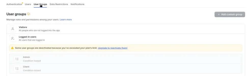 Softr Studio User Groups page on the Basic plan: warning that user groups are deactivated because of the plan limit, with the Admin and Client groups greyed out